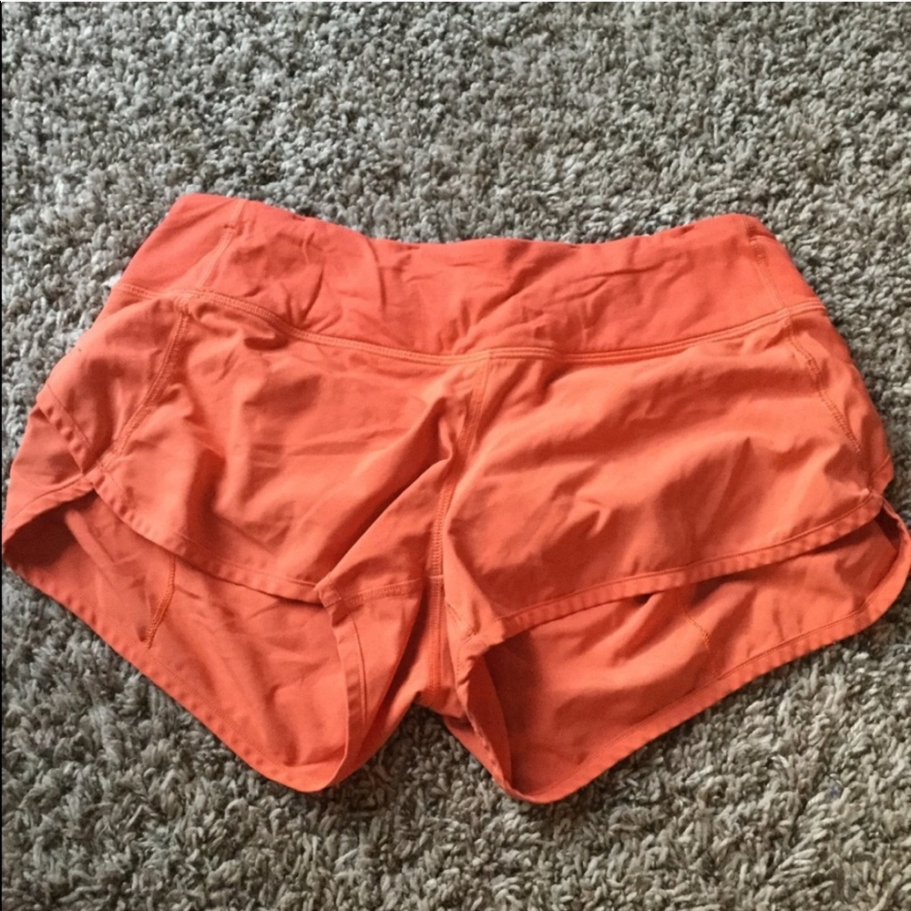 Orange Lululemon shorts